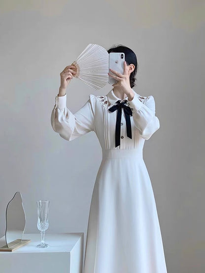 Autumn women's clothing 2023 new high-end light luxury retro waist slimming temperament age-reducing fairy early autumn dress