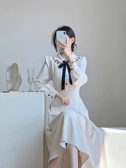 Autumn women's clothing 2023 new high-end light luxury retro waist slimming temperament age-reducing fairy early autumn dress