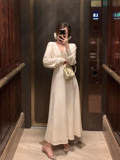 Tongse | Charming thoughts, the king of inner wear! Autumn and winter simple commuting white long skirt with coat dress
