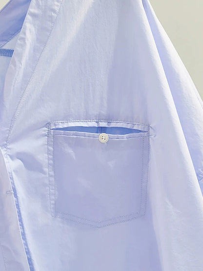 100 yuan for three pieces. Contact customer service to change the price. Blue three-quarter rolled-up sleeves, lazy literary V-neck casual shirt