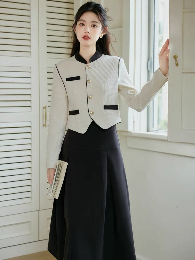 Autumn clothing is matched with a complete set of 2023 new stand-up collar long-sleeved tops and salt-style light and mature style skirts.