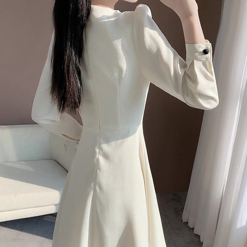 2023 new autumn clothing fashion temperament commuting v-neck splicing French slim niche design long-sleeved dress