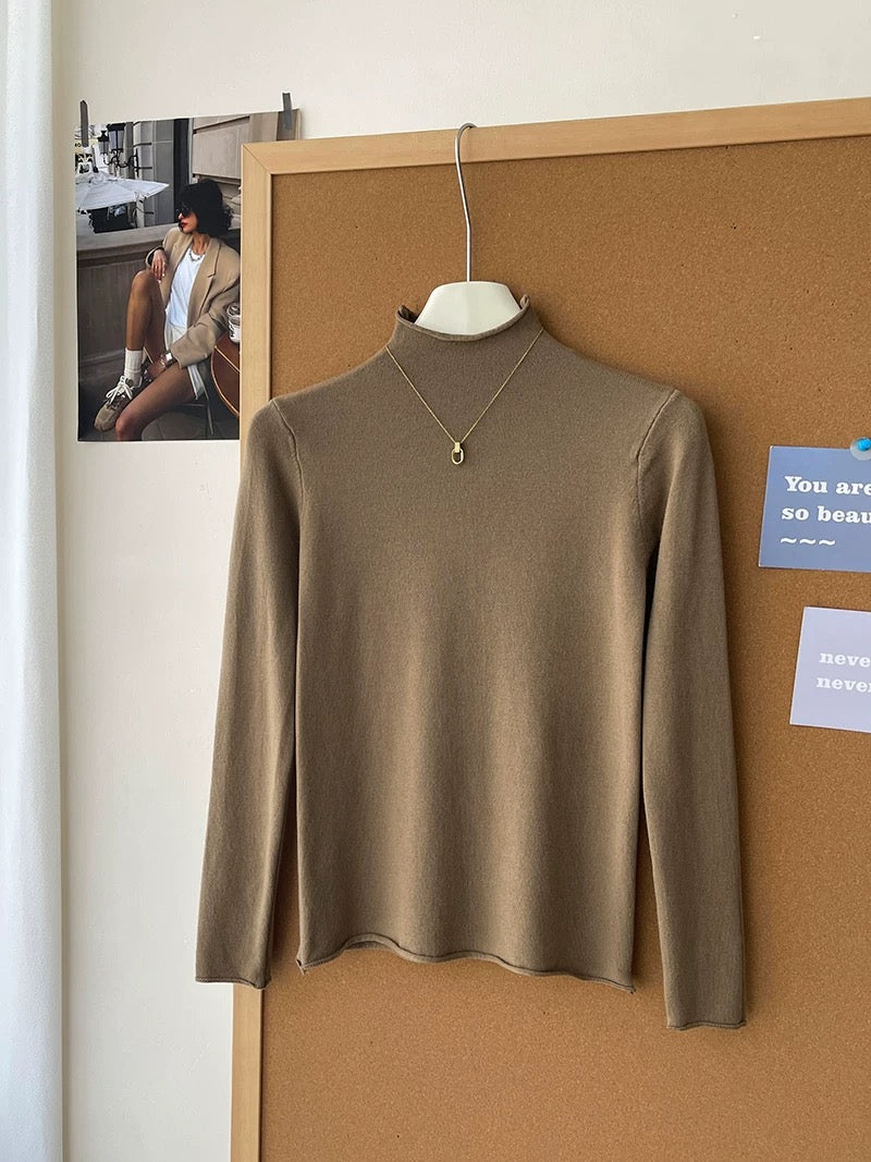 Retro soft and sticky cashmere rolled-edge turtleneck knit sweater for women, autumn and winter, gentle and versatile layering base layer top.