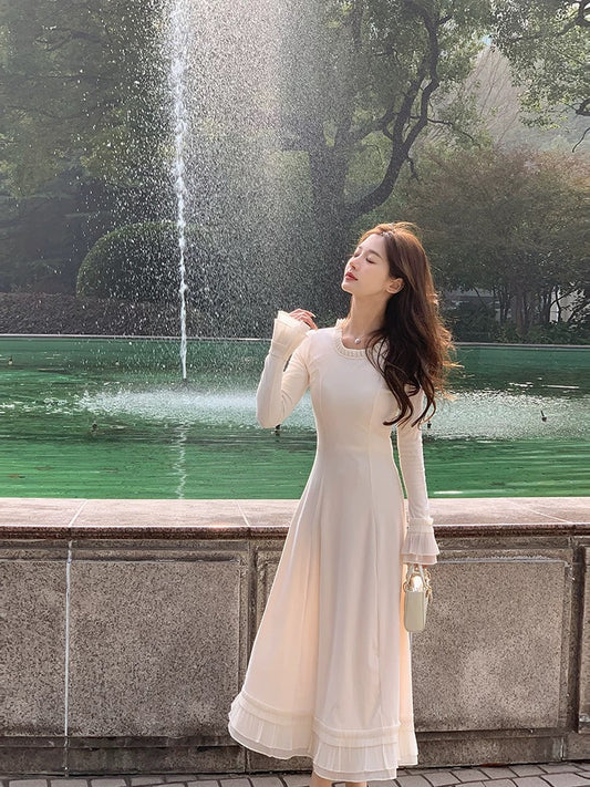 WITHMXBOOM Huihuijia slim long-sleeved dress for women in autumn and winter with a French design and elegant long skirt