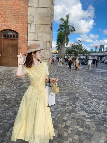 Fish Rabbit Rabbit Bohemian yellow dress female summer 2024 new slim swing long skirt