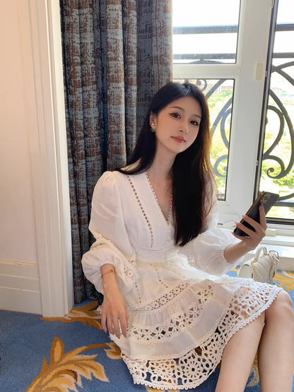 Juicecola white v-neck lace hollow long-sleeved dress for women spring and autumn French heavy industry high-end a-line skirt D071