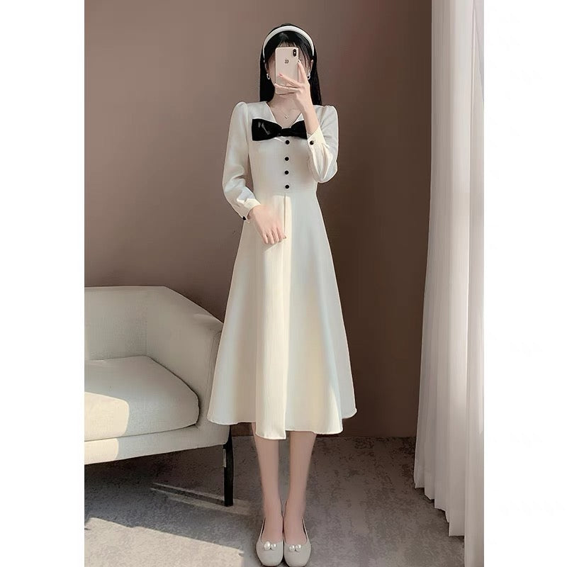 2023 new autumn clothing fashion temperament commuting v-neck splicing French slim niche design long-sleeved dress