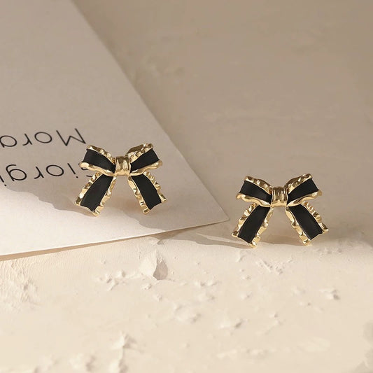 925 silver needle French bow earrings for women, niche design, unique earrings, light luxury, high-end autumn and winter earrings