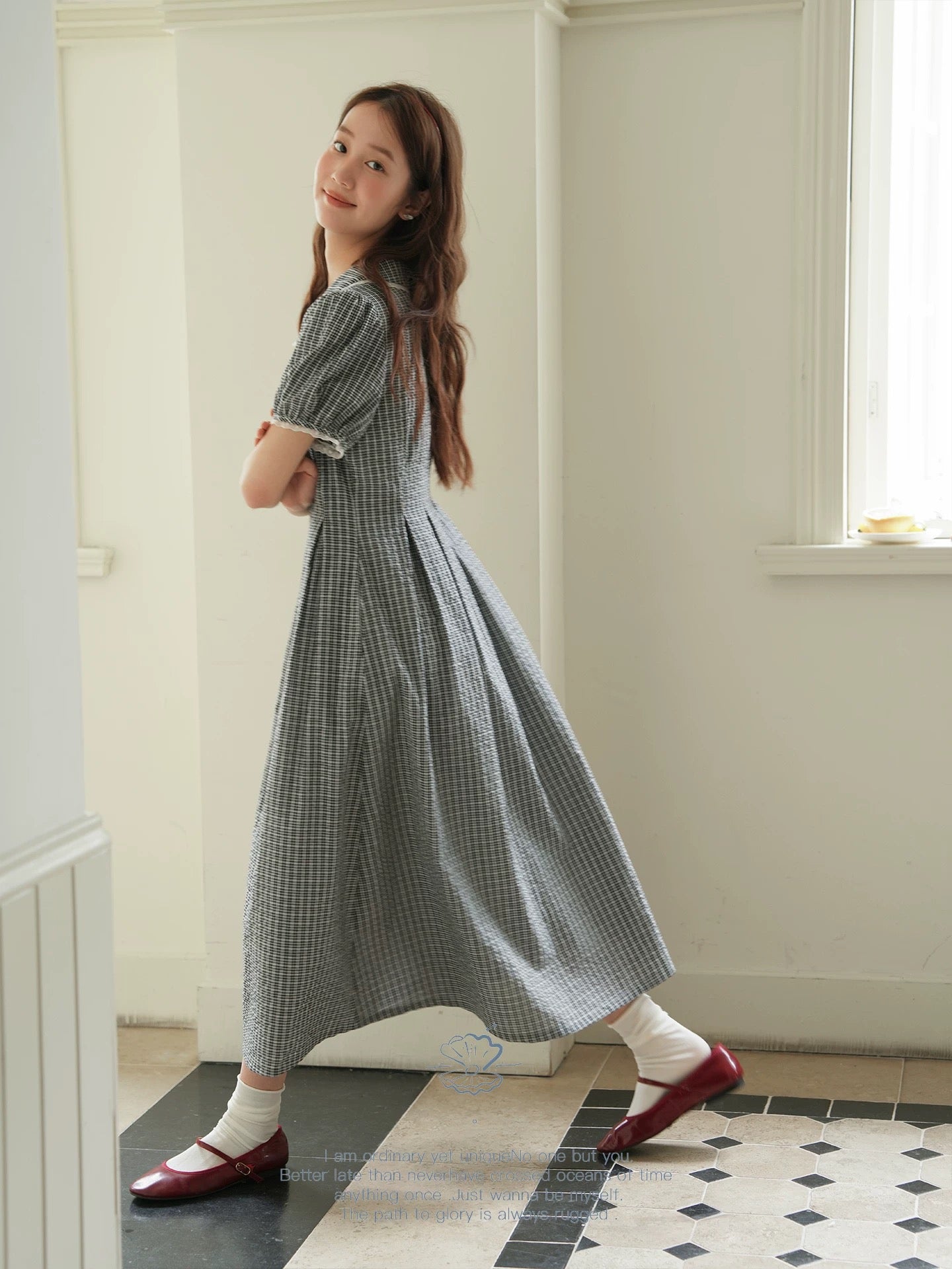 Nov elist One French-style black and white checkered shirt dress, mid-length, V-neck, slimming and flattering.