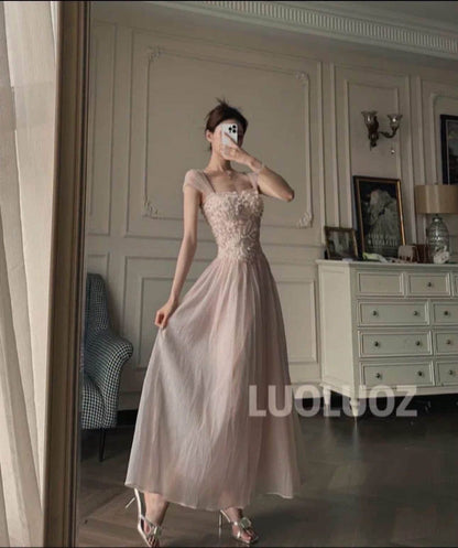 LUOLUOZ "Cherry Blossom Whisper" – A gentle-style, long dress featuring intricate embroidery, a soft square neckline, and a waist-cinching silhouette (JF138).