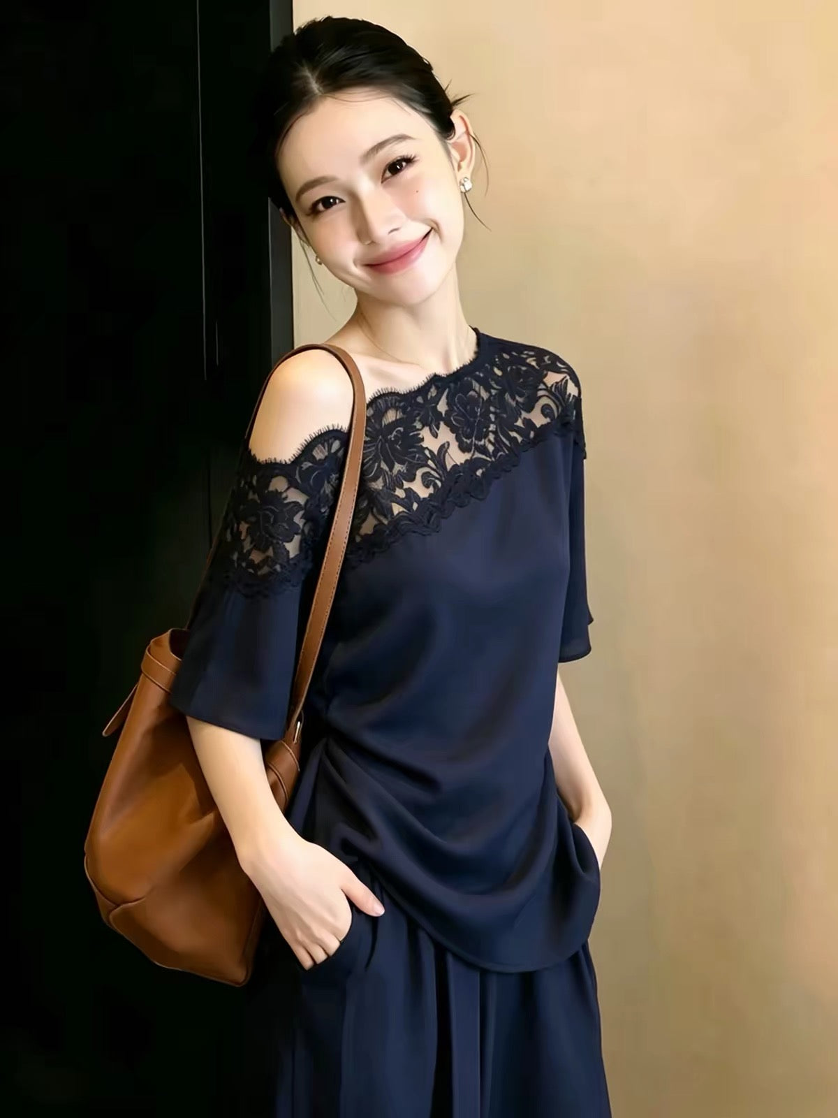 Elegant and stylish women's summer top in navy blue, featuring a sexy off-the-shoulder cut, fitted waist, and asymmetrical lace short-sleeve design.