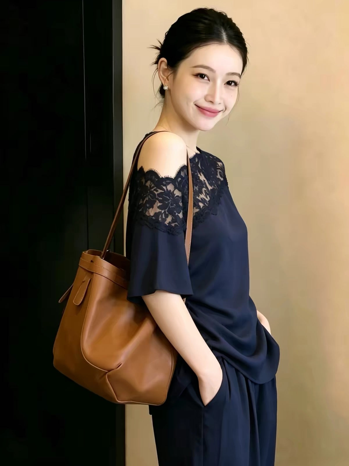 Elegant and stylish women's summer top in navy blue, featuring a sexy off-the-shoulder cut, fitted waist, and asymmetrical lace short-sleeve design.