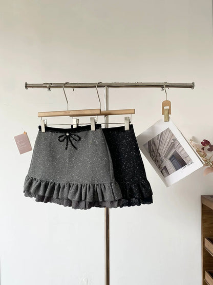 Ruffled high-waisted anti-exposure sequined A-line skirt for women, 2025 winter new Korean style black short skirt
