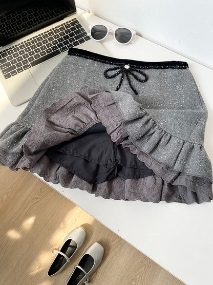 Ruffled high-waisted anti-exposure sequined A-line skirt for women, 2025 winter new Korean style black short skirt