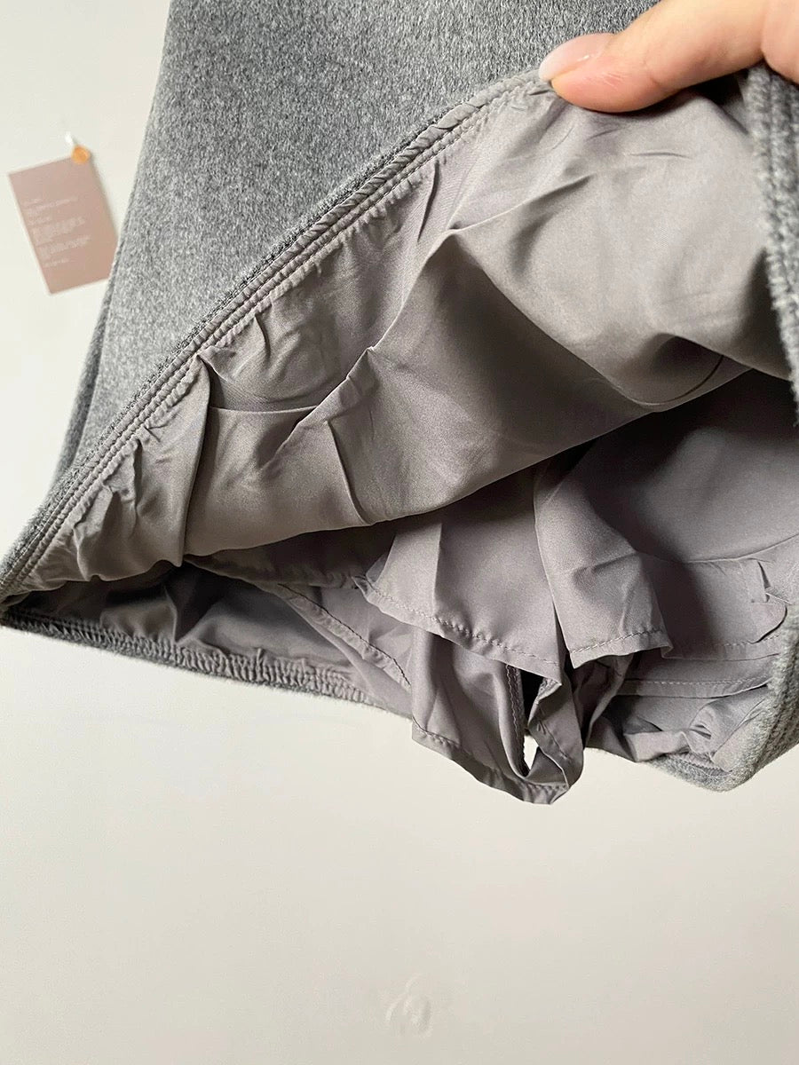 Trendy high-waisted, anti-exposure wool A-line mini skirt for women, new winter 2025 style, Korean style, versatile black skirt.