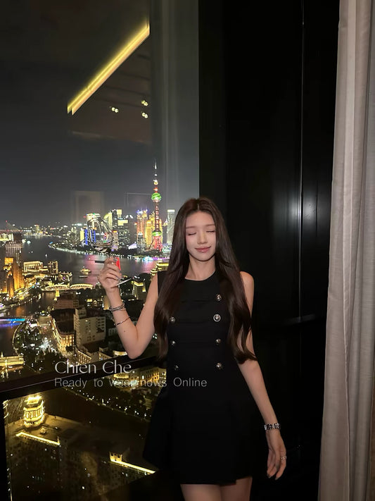 Chien "Napoleon Banquet" Collection: A sophisticated, sleeveless black dress featuring a vintage-inspired, "Chanel-esque" aesthetic and a refined, aristocratic flair.