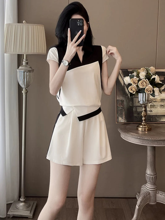 2025 new summer European station casual sports suit female design splicing short-sleeved top shorts two-piece suit