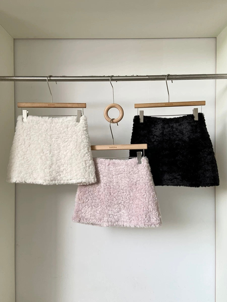 Faux lamb wool high-waisted thickened anti-exposure pink mini skirt for women, 2025 winter new Korean style versatile bodycon skirt