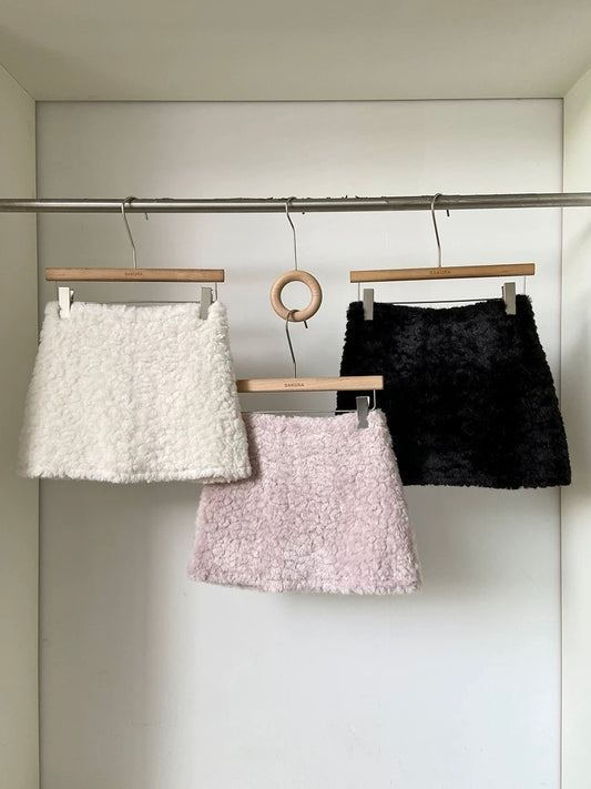Faux lamb wool high-waisted thickened anti-exposure pink mini skirt for women, 2025 winter new Korean style versatile bodycon skirt