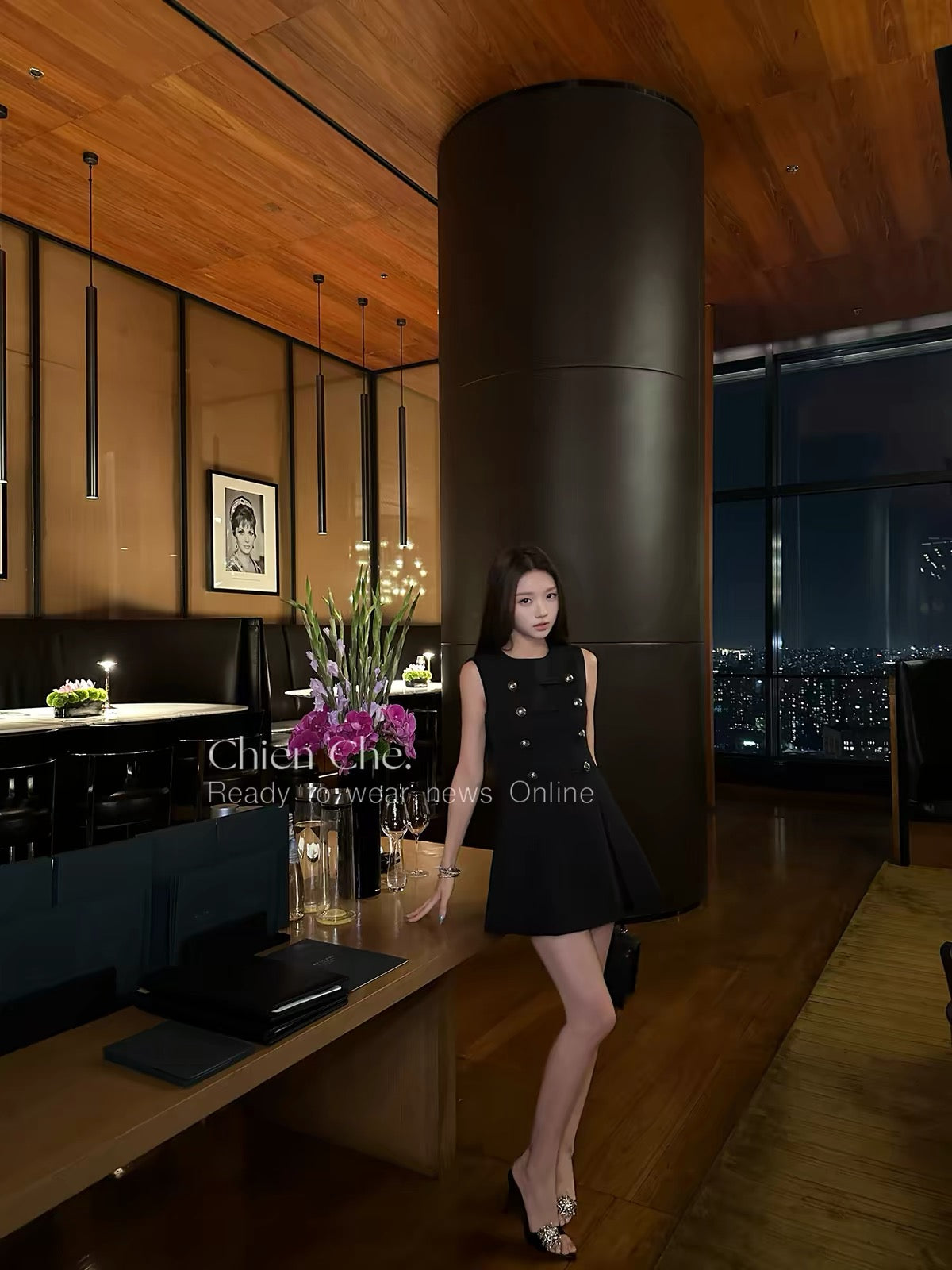 Chien "Napoleon Banquet" Collection: A sophisticated, sleeveless black dress featuring a vintage-inspired, "Chanel-esque" aesthetic and a refined, aristocratic flair.