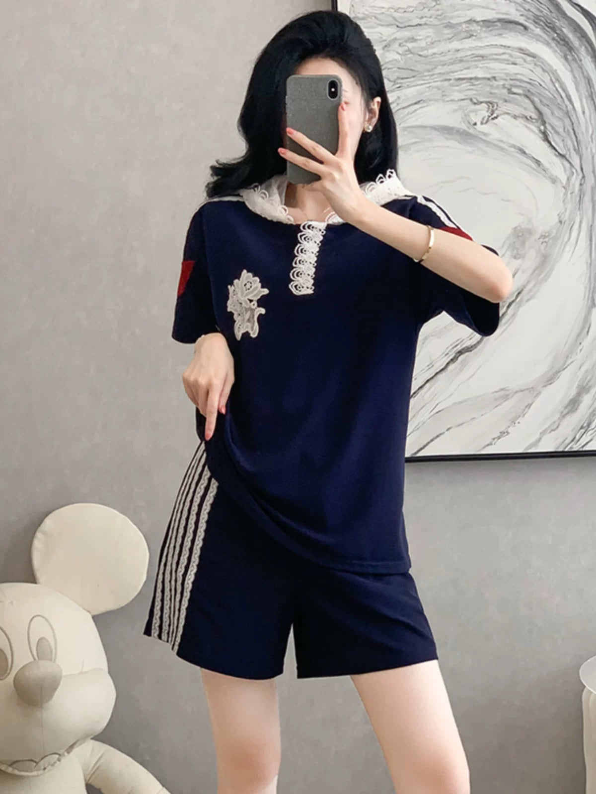 European station casual sports suit summer 2025 new fashion age-reducing short-sleeved tops and shorts two-piece suits for women