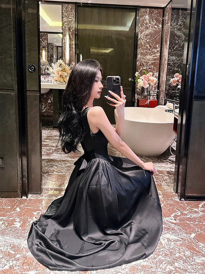 High-end temperament French suspender dress for women summer 2024 new Hepburn style black slimming long skirt with large swing skirt