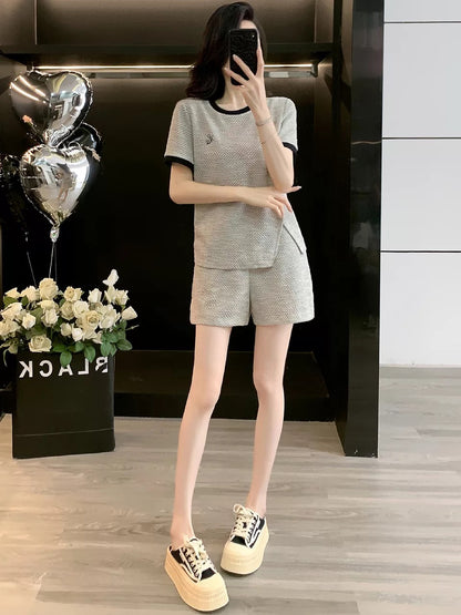 High-end European casual sports suit for women 2025 summer niche design slim short-sleeved top shorts two-piece suit