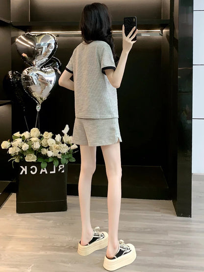 High-end European casual sports suit for women 2025 summer niche design slim short-sleeved top shorts two-piece suit