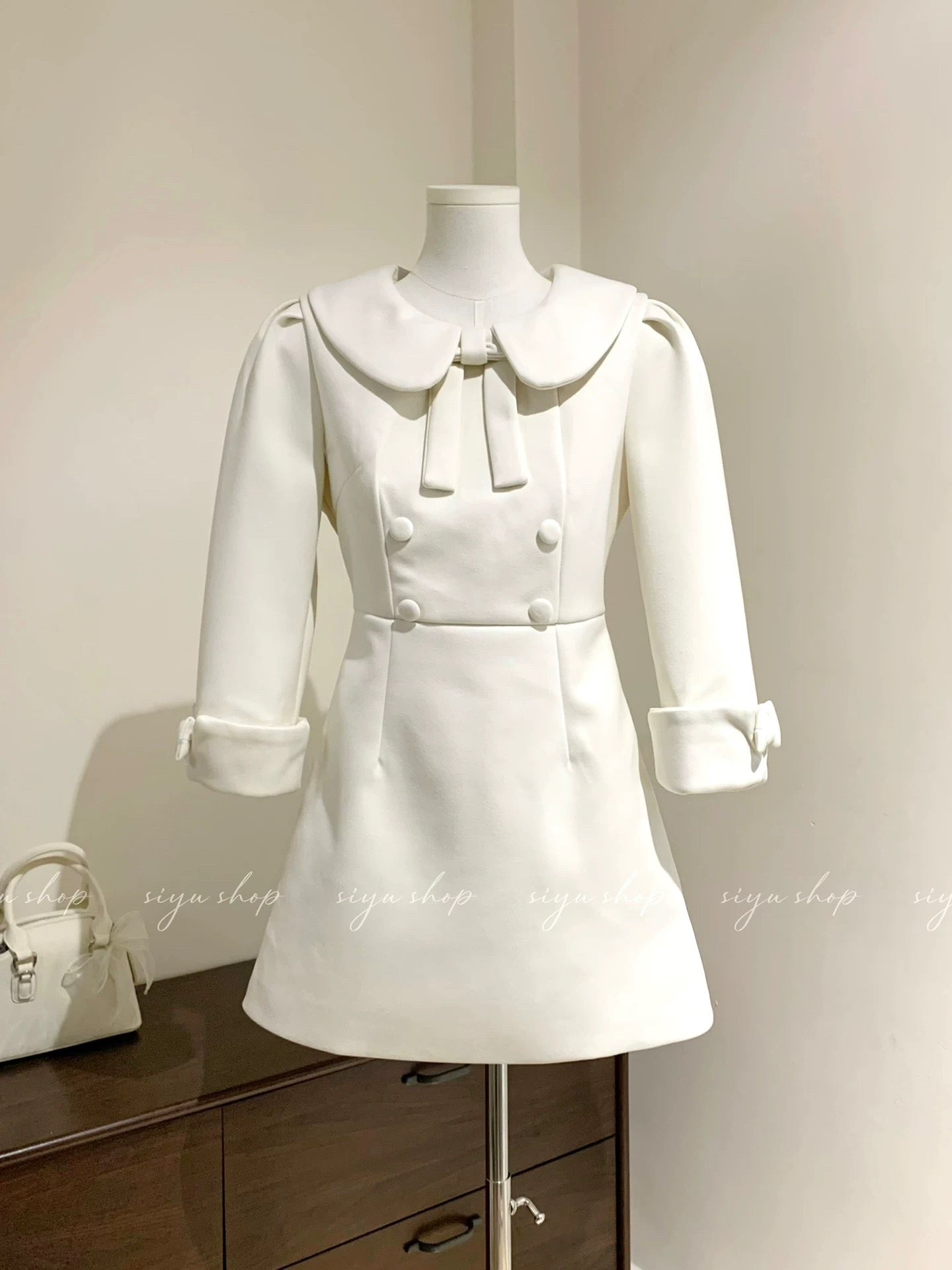 Milk and Fermented Rice Dress with Creamy Peter Pan Collar, Bow Tie, Double-Breasted, Wool Fit, Elegant Autumn/Winter