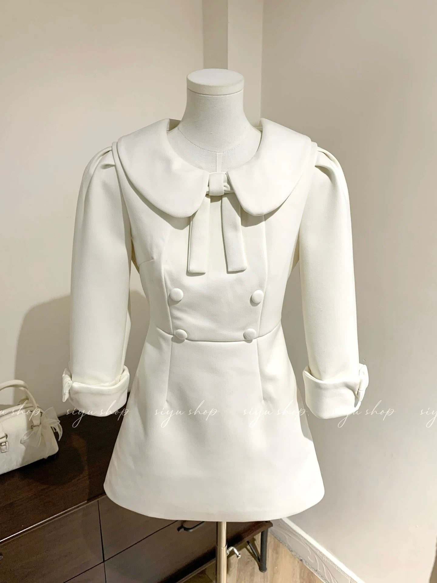 Milk and Fermented Rice Dress with Creamy Peter Pan Collar, Bow Tie, Double-Breasted, Wool Fit, Elegant Autumn/Winter