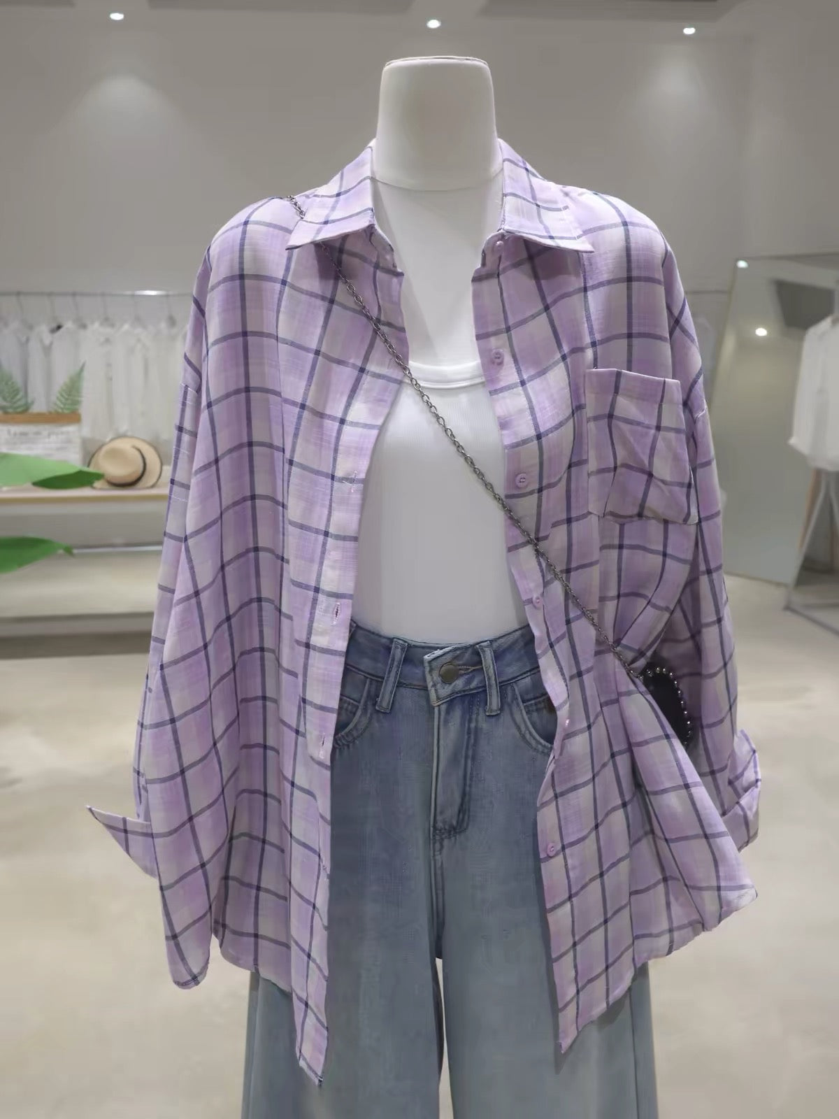Korean-style soft, breathable, double-layered plaid cotton shirt for women—loose, mid-length, hip-covering, and long-sleeved (Summer 2026).