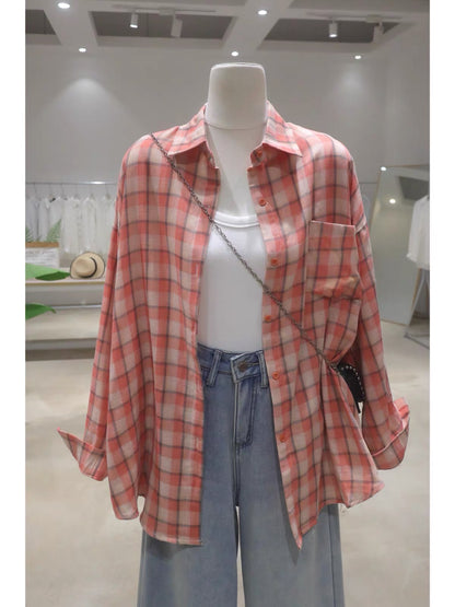 Korean-style soft, breathable, double-layered plaid cotton shirt for women—loose, mid-length, hip-covering, and long-sleeved (Summer 2026).