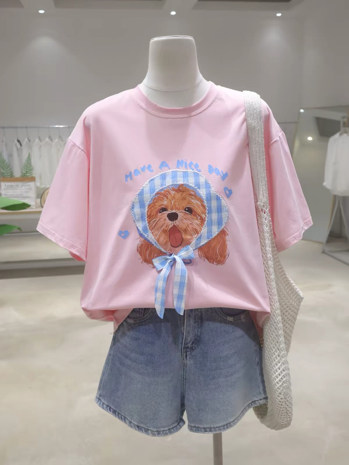 Flattering, youthful-look pure cotton short-sleeve T-shirt for women—featuring a bow and cartoon puppy design; loose, slimming, and versatile style for Summer 2026.