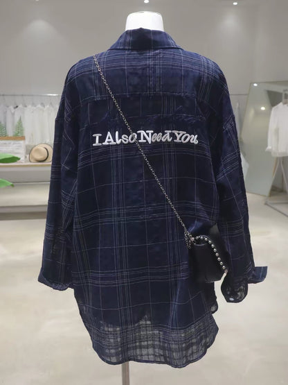 Korean-style breathable cotton plaid long-sleeve shirt for women; loose, mid-length fit; featuring elaborate, dimensional letter embroidery (Summer 2026).