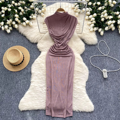 A sophisticated and elegant midi dress with a goddess-like aura, featuring subtle pleats that accentuate the waist and create a slimming effect. A European-style long bodycon dress.
