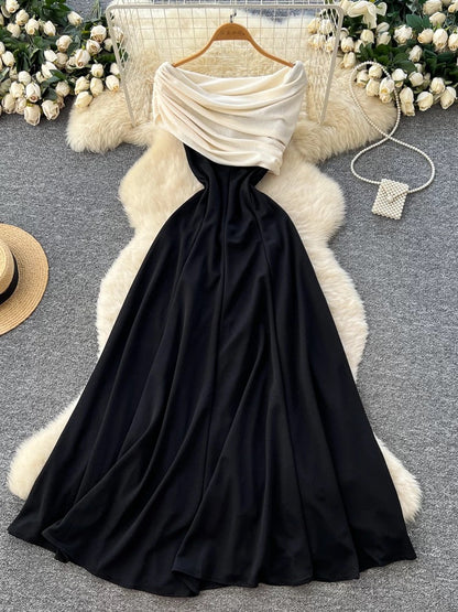 French goddess style, high-end color-blocked shawl, waist-cinching, slimming, elegant off-the-shoulder black dress