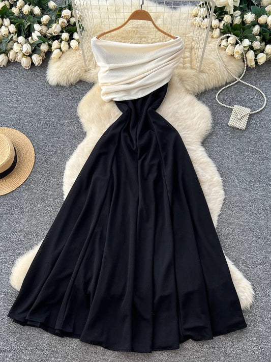 French goddess style, high-end color-blocked shawl, waist-cinching, slimming, elegant off-the-shoulder black dress