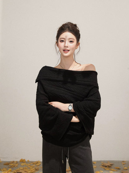 Xie Burou black oblique shoulder cable knit long-sleeved sweater women's autumn new lazy loose slim woolen top