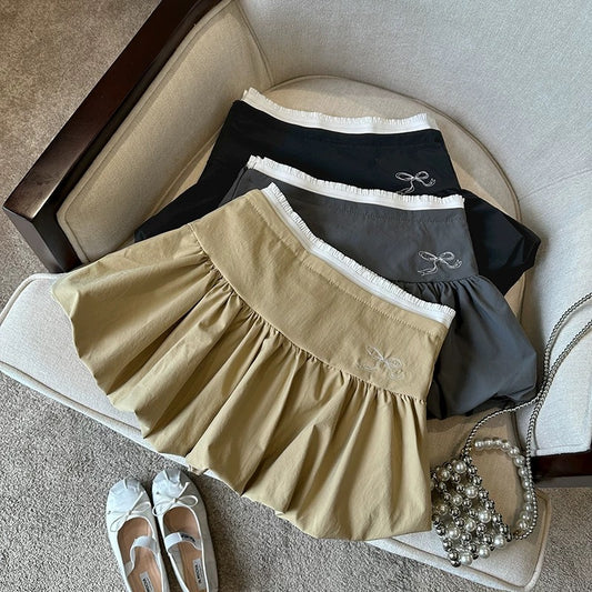 Sexy hot girl flower bud pleated skirt female summer high waist niche bow slim a-line short skirt puffy skirt