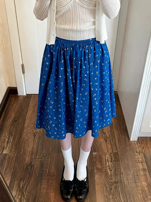 Korean style retro floral print midi skirt, new spring/summer style, high-waisted A-line, casual, unique design, flowing and versatile.