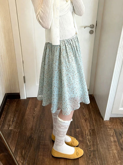 French retro elegant color-blocked polka dot pleated midi skirt, new spring/summer style, high-waisted A-line, flowing and loose-fitting.