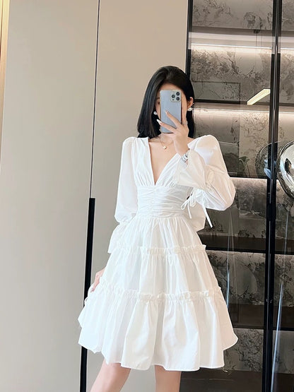 European station Vietnamese fashion brand French ruffled V-neck sexy white trumpet sleeve dress with waist slimming women's clothing