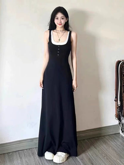 French Hepburn style black fake two-piece suspender dress women's summer design niche age-reducing slimming long skirt