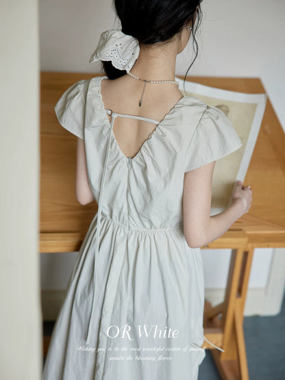 ORWhite2025 summer French retro pleated V-neck dress for women with textured workwear style Hepburn style slim