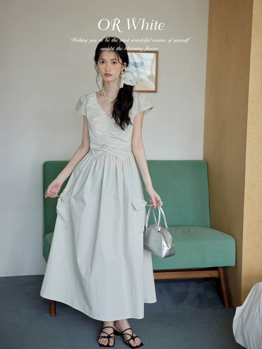 ORWhite2025 summer French retro pleated V-neck dress for women with textured workwear style Hepburn style slim