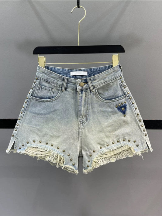 Retro studded lace patchwork denim shorts for women, 2026 summer, high-waisted, slimming A-line, slit wide-leg hot pants.