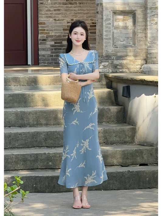 LILI Li Lijia [Letter from the Island] French holiday style long skirt 2025 summer new floral fishtail dress