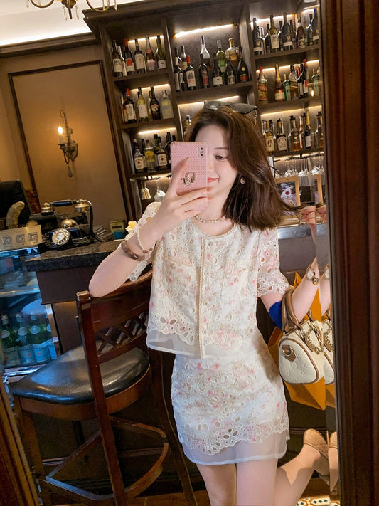 Xiaoxiangfeng hollow skirt two-piece suit for women 2024 summer new age-reducing temperament complete set