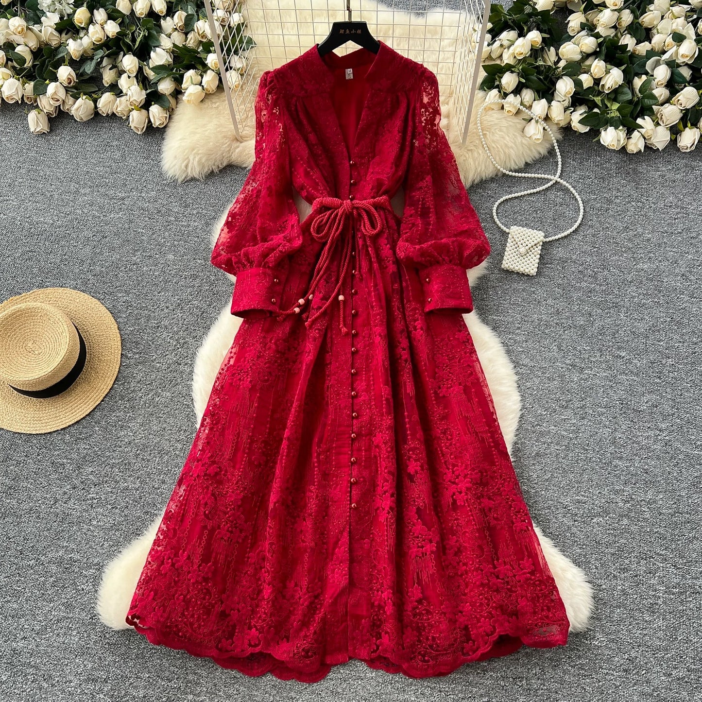 French high-end women's dress 2025 spring waist heavy embroidery V-neck lantern sleeves single-breasted long skirt