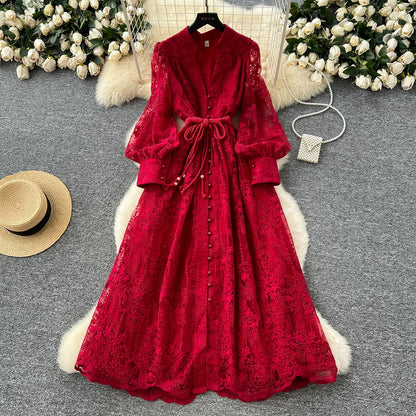 French high-end women's dress 2025 spring waist heavy embroidery V-neck lantern sleeves single-breasted long skirt